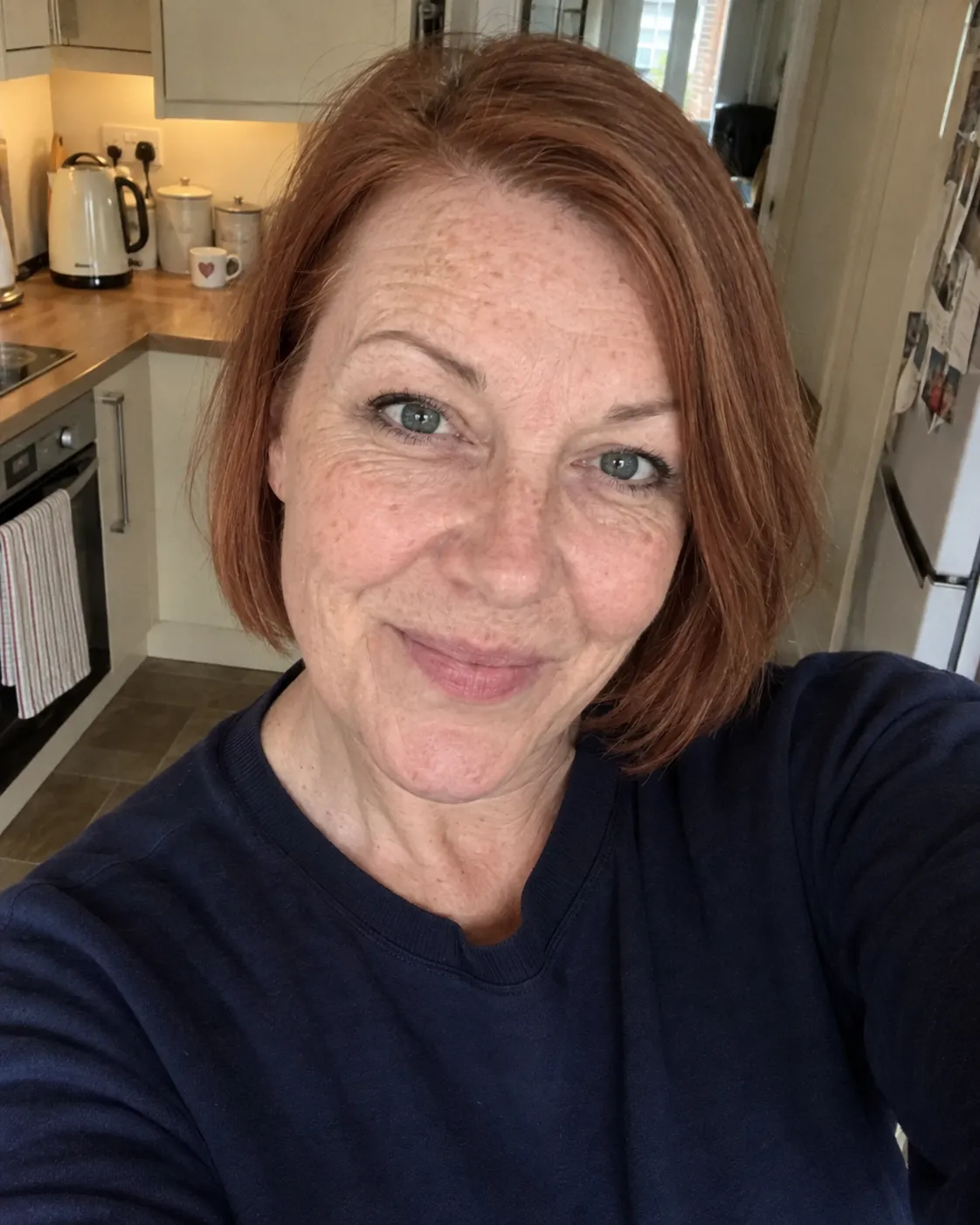 A client taking a casual selfie after her appointment.