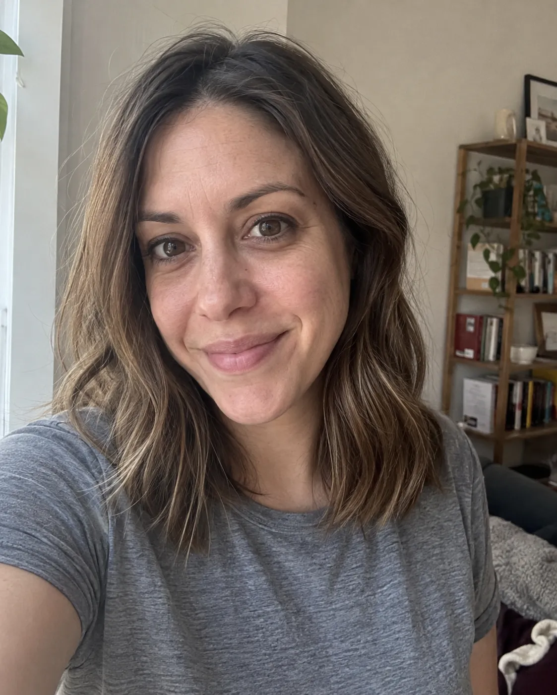 A client taking a casual selfie after her appointment.